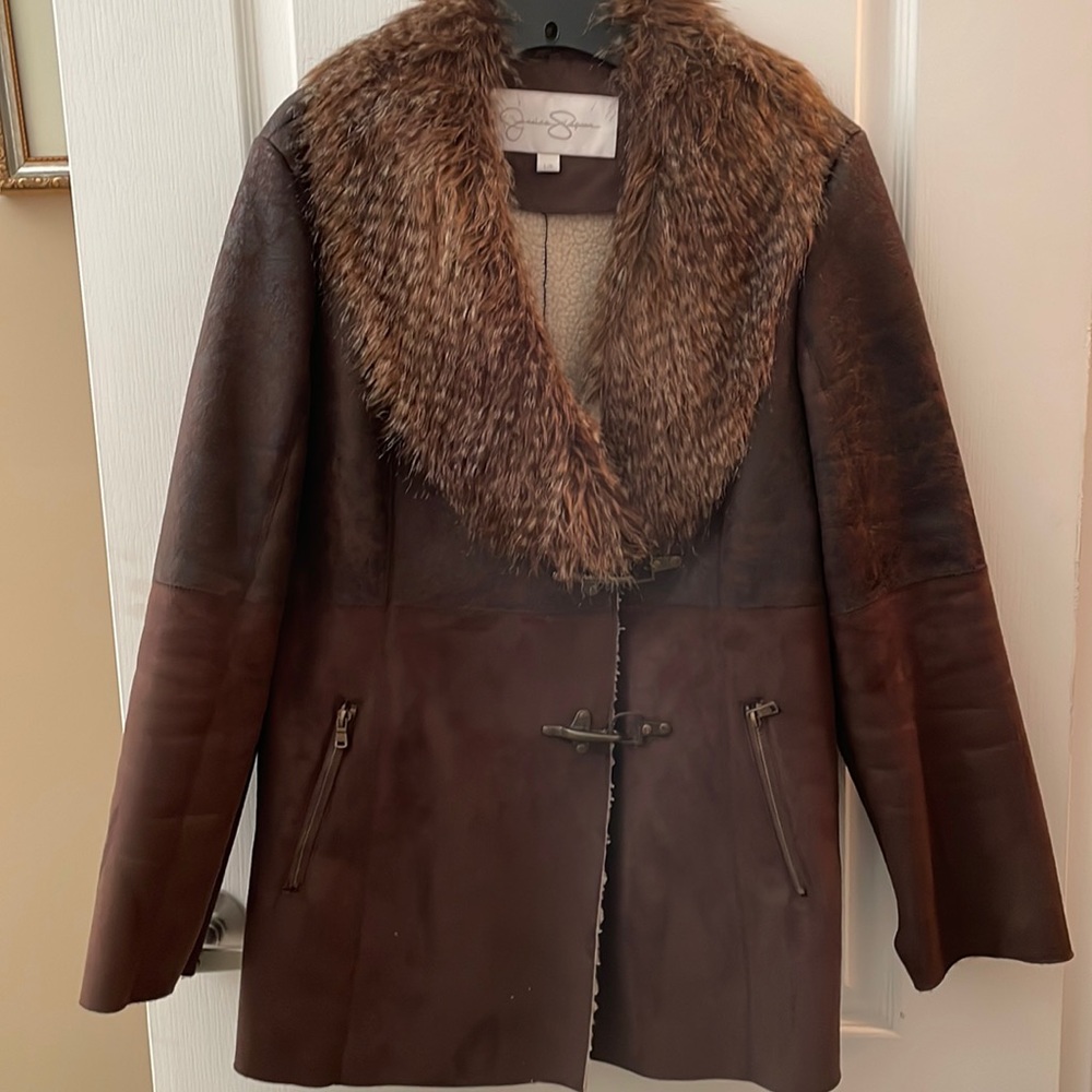 Women’s  size large Jacket Brown with Faux Fur collar.